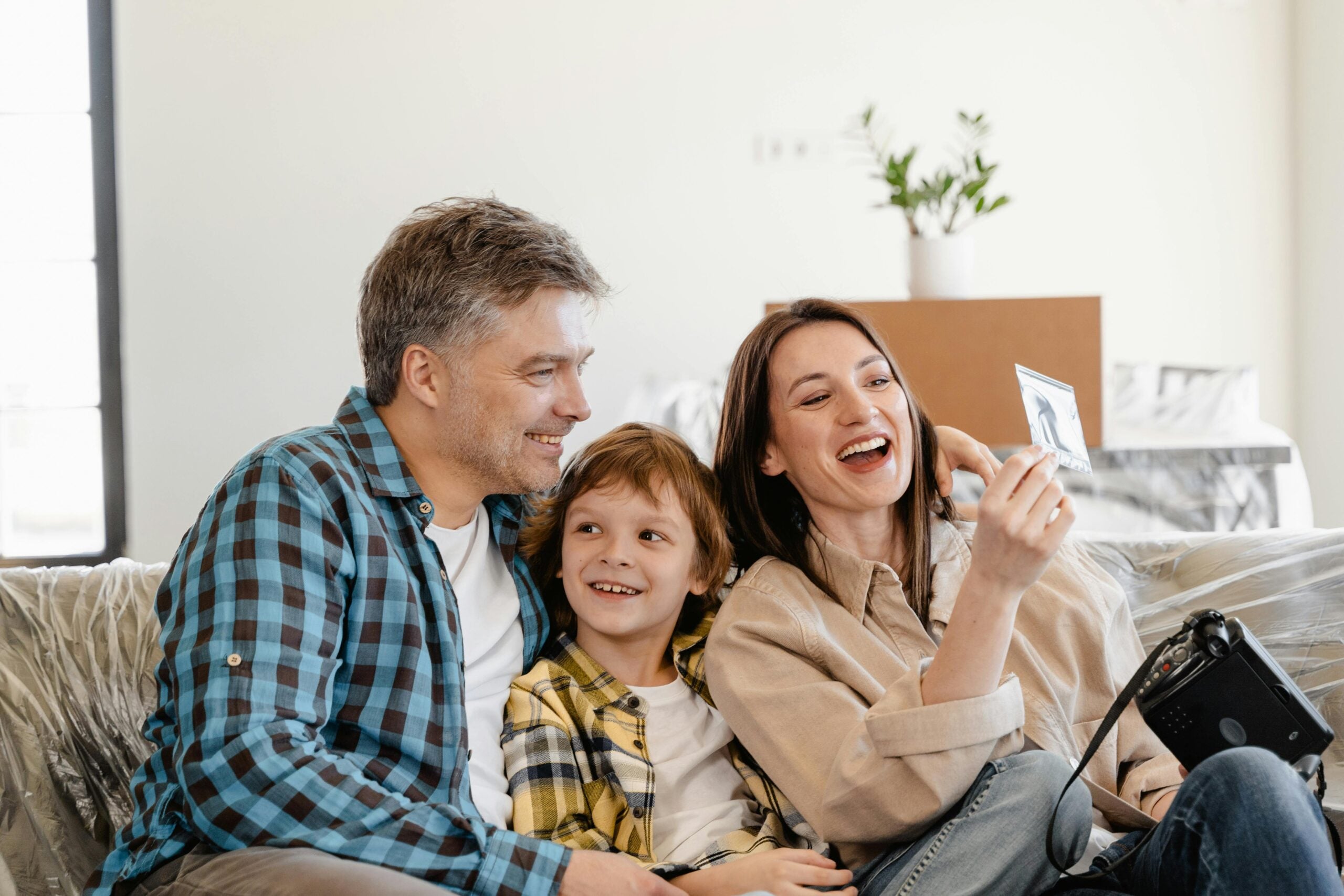 Happy_family_sitting_down